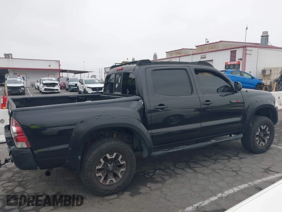 2009 Toyota Tacoma PreRunner with VIN 3TMJU62N99M076105, listed as a IAAI auction lot 42709523 with 206,948 mi miles and . Bid and sale history available at DreamBid. Image 14.