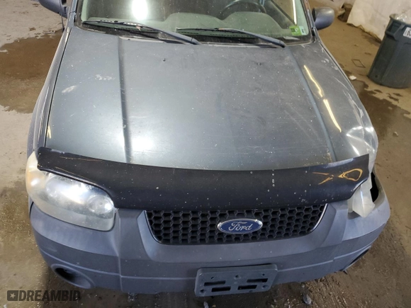 2006 Ford Escape XLS with VIN 1FMYU92Z56KA23659, listed as a Copart auction lot 76896374 with 0 mi miles and Salvage Title. Bid and sale history available at carsss.com. Image 12.