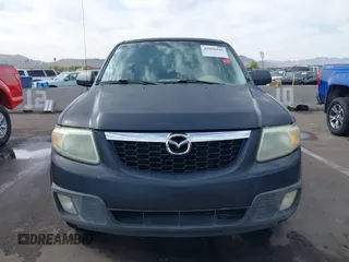 2008 Mazda Tribute ES with VIN 4F2CZ06188KM01024, listed as a IAAI auction lot 41890148 with 122,367 mi miles. Bid and sale history available at carsss.com. Image 12.