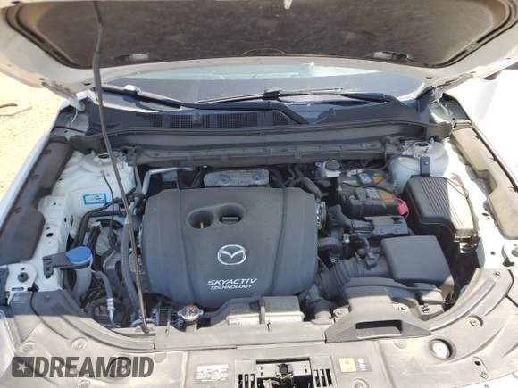 2018 Mazda CX-5 Grand Touring z VIN JM3KFBDM1J0473754, wystawiony jako Copart lot #60362245 z przebiegiem 72 792 mil mil oraz Szkoda całkowita • Salvage title. Historia ofert i sprzedaży dostępna na DreamBid. Obrazek 12.