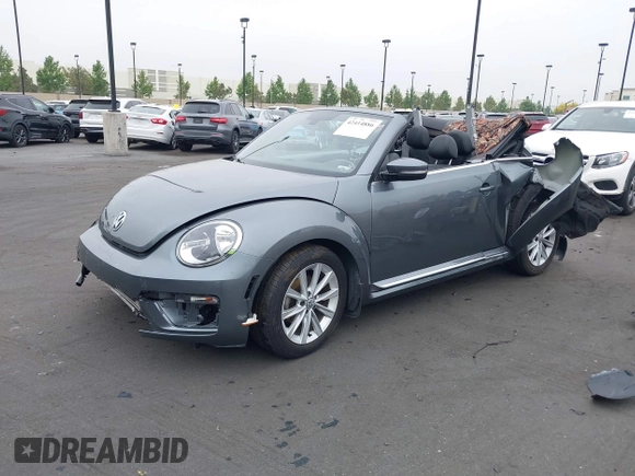2018 Volkswagen Beetle S z VIN 3VW5DAAT3JM506023, wystawiony jako IAAI lot #42414886 z przebiegiem 33 424 mil mil oraz . Historia ofert i sprzedaży dostępna na DreamBid. Obrazek 2.