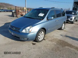 2010 Kia Sedona EX with VIN KNDMH4C32A6325352, listed as a IAAI auction lot 41863846 with 92,813 mi miles. Bid and sale history available at carsss.com. Image 2.