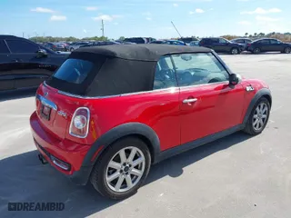 2011 MINI Cooper Convertible s with VIN WMWZP3C55BT249405, listed as a IAAI auction lot 41461640 with 59,856 mi miles. Bid and sale history available at carsss.com. Image 4.