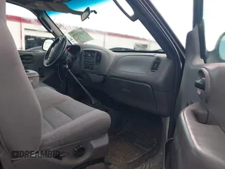 2003 Ford F-150 XL with VIN 1FTRF17233NB49481, listed as a IAAI auction lot 42562599 with 158,599 mi miles and . Bid and sale history available at DreamBid. Image 5.