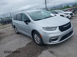 2024 Chrysler Pacifica Touring L with VIN 2C4RC1BG9RR128397, listed as a IAAI auction lot 42535935 with 43,144 mi miles and . Bid and sale history available at DreamBid. Image 1.