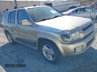 2002 Infiniti QX4 Luxury z VIN JNRDR09Y32W261736, wystawiony jako IAAI lot #41644533 z przebiegiem 245 543 mil mil oraz . Historia ofert i sprzedaży dostępna na DreamBid. Obrazek 1.