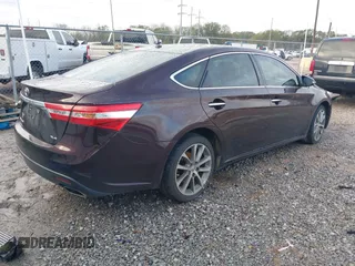 2014 Toyota Avalon Limited with VIN 4T1BK1EB5EU125963, listed as a IAAI auction lot 41273746 with 109,229 mi miles. Bid and sale history available at carsss.com. Image 4.