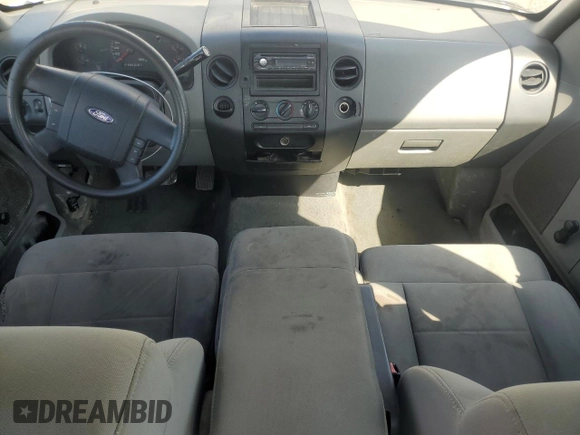 2007 Ford F-150 STX with VIN 1FTRX12W47FB00233, listed as a Copart auction lot 61870565 with 205,846 mi miles and Clean title. Bid and sale history available at DreamBid. Image 8.