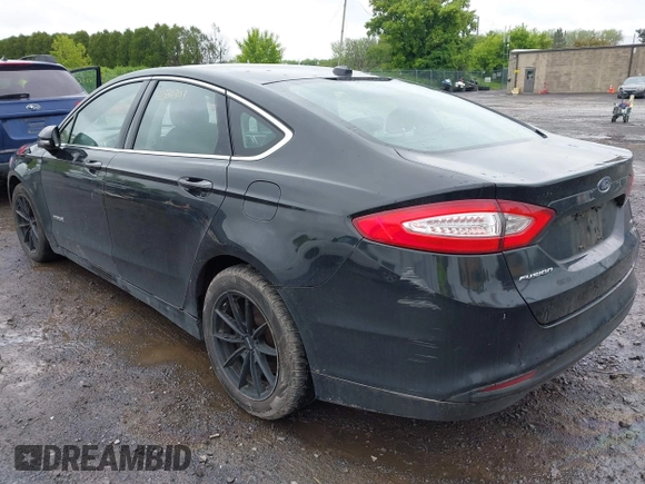 2014 Ford Fusion SE Hybrid with VIN 3FA6P0LU9ER310990, listed as a IAAI auction lot 42336303 with 197,588 mi miles and . Bid and sale history available at DreamBid. Image 3.
