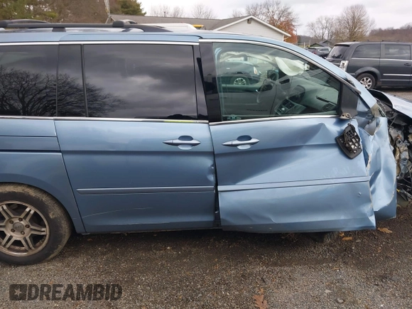 2008 Honda Odyssey EX-L with VIN 5FNRL38678B092343, listed as a IAAI auction lot 40974522 with 209,280 mi miles and . Bid and sale history available at DreamBid. Image 14.