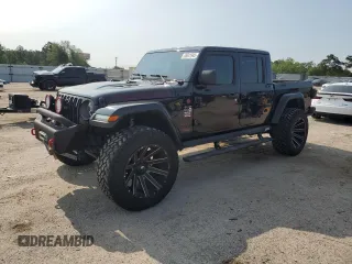 2020 Jeep Gladiator Rubicon z VIN 1C6JJTBG2LL166964, wystawiony jako Copart lot #58041945 z przebiegiem 62 716 mil mil oraz Szkoda całkowita • Salvage title. Historia ofert i sprzedaży dostępna na DreamBid. Obrazek 1.