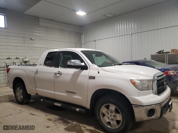 2012 Toyota Tundra 4WD Truck with VIN 5TFUW5F1XCX244862, listed as a Copart auction lot 82760194 with 234,657 mi miles and Salvage Title. Bid and sale history available at carsss.com. Image 4.