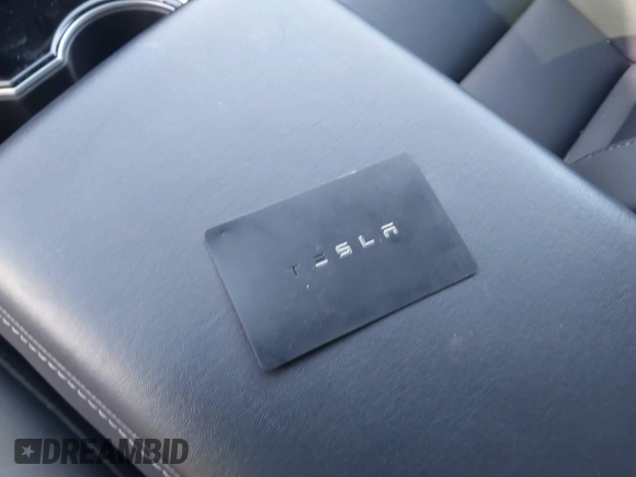 2020 Tesla Model 3 Long Range with VIN 5YJ3E1EB4LF619026, listed as a IAAI auction lot 41796901 with Not Provided miles and . Bid and sale history available at DreamBid. Image 9.