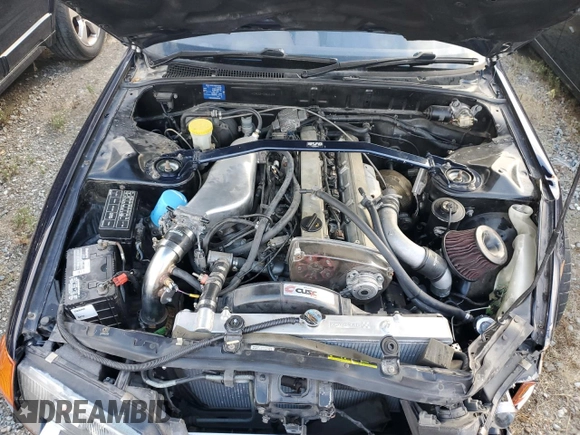1990 Nissan Skyline z VIN HCR32080128, wystawiony jako Copart lot #77564184 z przebiegiem 96 455 mil mil oraz Szkoda całkowita • Salvage title. Historia ofert i sprzedaży dostępna na DreamBid. Obrazek 11.