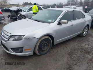 2012 Ford Fusion SE with VIN 3FAHP0HA9CR164546, listed as a IAAI auction lot 42016566 with 185,251 mi miles. Bid and sale history available at carsss.com. Image 2.