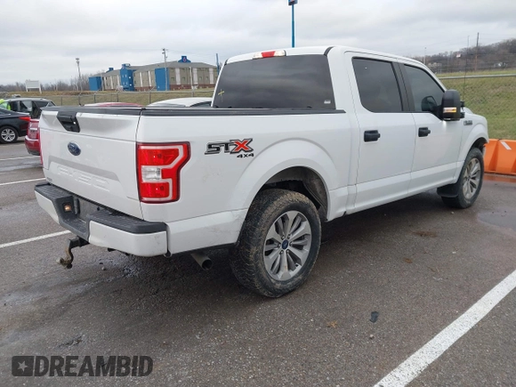 2018 Ford F-150 XL with VIN 1FTEW1E59JKD99284, listed as a IAAI auction lot 41203530 with 153,800 mi miles. Bid and sale history available at carsss.com. Image 4.