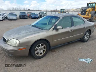 2002 Mercury Sable GS z VIN 1MEFM50U52A643924, wystawiony jako IAAI lot #41900910 z przebiegiem 150 413 mil mil oraz . Historia ofert i sprzedaży dostępna na DreamBid. Obrazek 2.