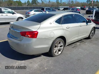 2014 Chevrolet Impala LT with VIN 2G1125S33E9256206, listed as a IAAI auction lot 41829287 with 198,661 mi miles and . Bid and sale history available at DreamBid. Image 4.