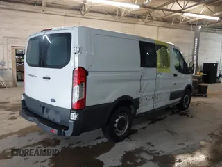 2018 Ford Transit with VIN 1FTYE1ZM2JKB30853, listed as a IAAI auction lot 42025674 with 188,545 mi miles and . Bid and sale history available at DreamBid. Image 4.