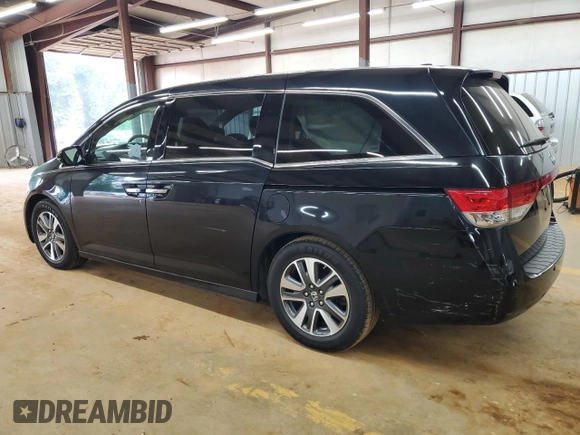 2015 Honda Odyssey Touring Elite with VIN 5FNRL5H99FB005576, listed as a Copart auction lot 58963215 with 167,967 mi miles and Salvage title. Bid and sale history available at DreamBid. Image 2.
