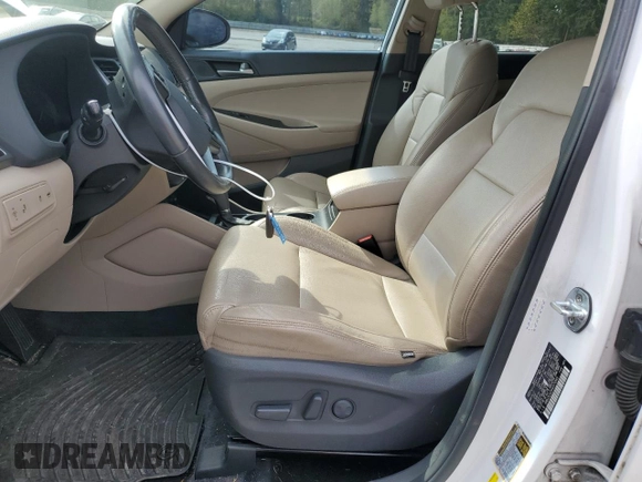 2017 Hyundai Tucson Sport with VIN KM8J3CA25HU570945, listed as a Copart auction lot 52555265 with 124,192 mi miles and Salvage Title. Bid and sale history available at DreamBid. Image 7.