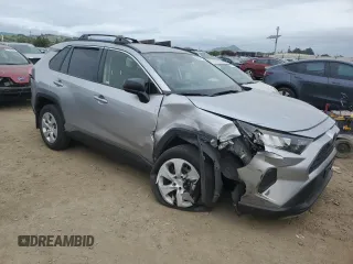 2019 Toyota RAV4 LE with VIN JTMH1RFV7KJ003899, listed as a Copart auction lot 52204315 with 27,491 mi miles and Salvage Title. Bid and sale history available at carsss.com. Image 4.