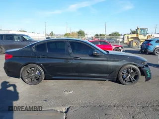 2019 BMW 5 Series M550i xDrive with VIN WBAJB9C51KB288416, listed as a IAAI auction lot 41265378 with 52,529 mi miles and . Bid and sale history available at DreamBid. Image 14.