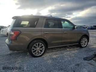 2019 Ford Expedition Platinum with VIN 1FMJU1LTXKEA56503, listed as a Copart auction lot 45657785 with 104,839 mi miles and Salvage Title. Bid and sale history available at carsss.com. Image 3.