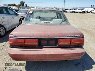 1990 Toyota Camry LE ECT z VIN JT2SV22E0L0351440, wystawiony jako Copart lot #70768614 z przebiegiem 176 239 mil mil oraz Szkoda całkowita • Salvage title. Historia ofert i sprzedaży dostępna na DreamBid. Obrazek 6.