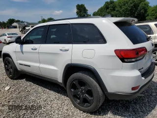 2019 Jeep Grand Cherokee Laredo E with VIN 1C4RJFAG8KC637464, listed as a Copart auction lot 60451115 with 102,105 mi miles and Salvage title. Bid and sale history available at DreamBid. Image 2.