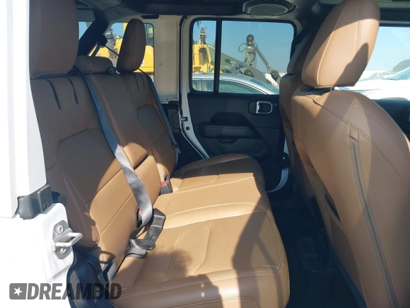 2021 Jeep Wrangler Unlimited Sahara z VIN 1C4JJXP6XMW840844, wystawiony jako IAAI lot #42152271 z przebiegiem 68 209 mil mil oraz . Historia ofert i sprzedaży dostępna na DreamBid. Obrazek 8.