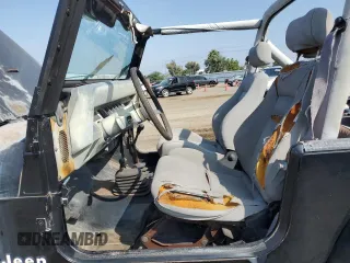 1990 Jeep Wrangler with VIN 2J4FY29T8LJ541585, listed as a Copart auction lot 54352634 with 138,022 mi miles and Salvage Title. Bid and sale history available at carsss.com. Image 7.