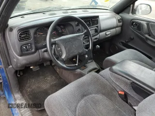 1999 Dodge Dakota SLT with VIN 1B7GL22X6XS298290, listed as a Copart auction lot 88682545 with 176,280 mi miles and Salvage Title. Bid and sale history available at carsss.com. Image 8.