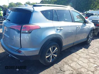 2018 Toyota RAV4 XLE with VIN 2T3WFREV6JW442859, listed as a IAAI auction lot 42252071 with 67,749 mi miles and . Bid and sale history available at DreamBid. Image 4.