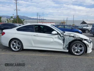2019 BMW 4 Series 430i with VIN WBA4W3C5XKAF93081, listed as a IAAI auction lot 41689477 with 87,936 mi miles and . Bid and sale history available at DreamBid. Image 6.