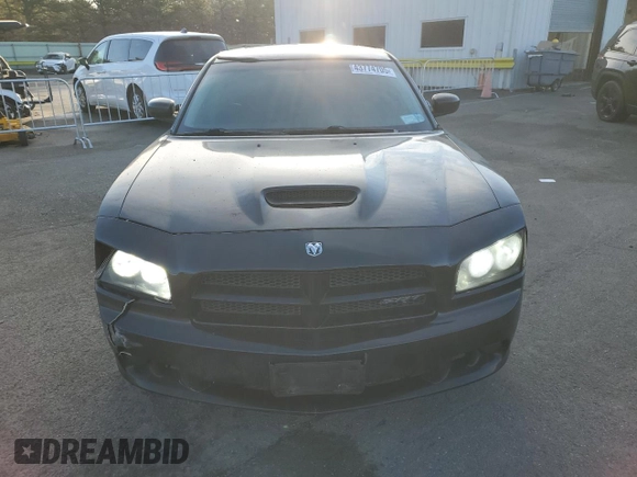 2006 Dodge Charger SRT-8 with VIN 2B3LA73W36H369475, listed as a Copart auction lot 43774705 with 130,495 mi miles and Salvage Title. Bid and sale history available at DreamBid. Image 5.