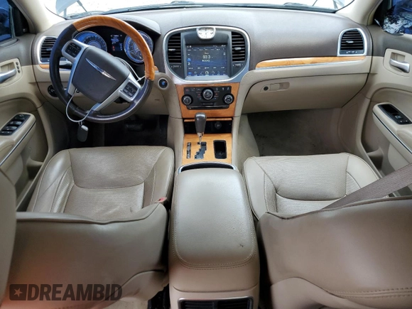 2012 Chrysler 300 C with VIN 2C3CCAKTXCH151465, listed as a Copart auction lot 65820264 with 132,609 mi miles and Salvage Title. Bid and sale history available at DreamBid. Image 8.