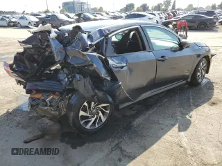 2016 Honda Civic EX with VIN 19XFC2F70GE214585, listed as a Copart auction lot 55607165 with 148,528 mi miles and Salvage Title. Bid and sale history available at DreamBid. Image 3.
