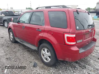2011 Ford Escape XLT with VIN 1FMCU0D70BKB19310, listed as a IAAI auction lot 42100801 with 211,028 mi miles. Bid and sale history available at carsss.com. Image 3.