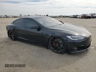 2020 Tesla Model S Performance with VIN 5YJSA1E49LF390948, listed as a Copart auction lot 47313715 with 95,143 mi miles and Salvage title. Bid and sale history available at DreamBid. Image 4.