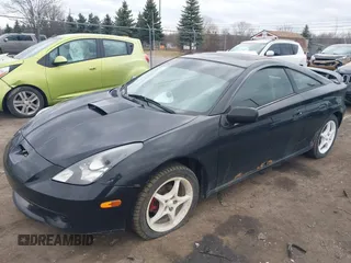 2000 Toyota Celica GT with VIN JTDDR32T7Y0006809, listed as a IAAI auction lot 41860933 with 262,014 mi miles. Bid and sale history available at carsss.com. Image 2.