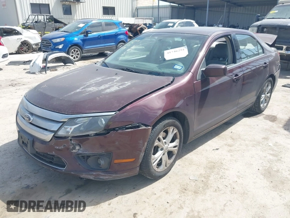 2012 Ford Fusion SE z VIN 3FAHP0HA1CR436376, wystawiony jako IAAI lot #41746291 z przebiegiem 148 748 mil mil oraz . Historia ofert i sprzedaży dostępna na DreamBid. Obrazek 18.