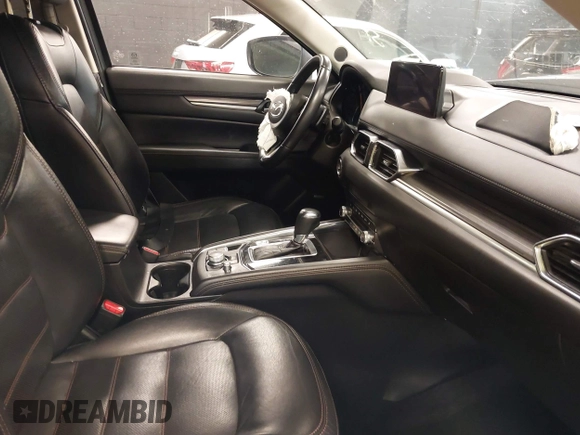 2021 Mazda CX-5 Grand Touring with VIN JM3KFBDM7M1392644, listed as a IAAI auction lot 41824612 with 80,000 mi miles and . Bid and sale history available at DreamBid. Image 5.