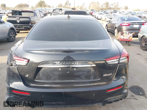2021 Maserati Ghibli S with VIN ZAM57YSA3M1365483, listed as a IAAI auction lot 41488486 with 51,954 mi miles and . Bid and sale history available at DreamBid. Image 16.