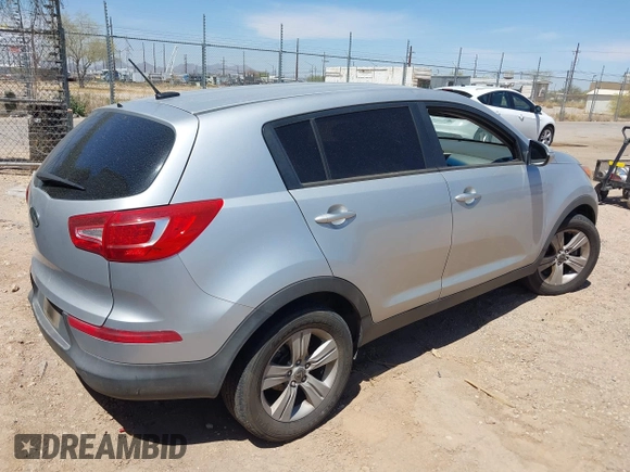 2012 Kia Sportage LX with VIN KNDPB3A27C7326884, listed as a IAAI auction lot 42010016 with 112,797 mi miles. Bid and sale history available at carsss.com. Image 4.