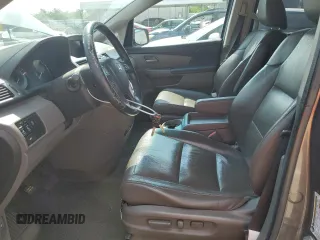 2011 Honda Odyssey EX-L with VIN 5FNRL5H61BB056652, listed as a Copart auction lot 54774015 with 233,125 mi miles and Salvage Title. Bid and sale history available at DreamBid. Image 7.