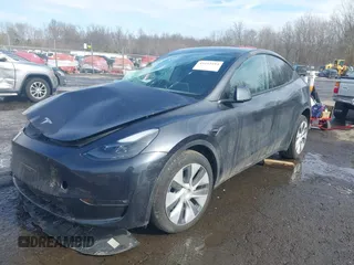 2024 Tesla Model Y Long Range with VIN 7SAYGDEE8RF084936, listed as a IAAI auction lot 41615104 with 14,622 mi miles. Bid and sale history available at carsss.com. Image 2.