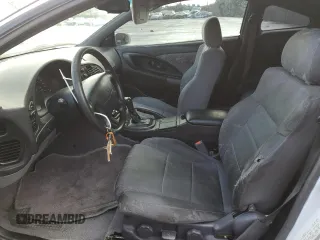 1998 Mitsubishi Eclipse with VIN 4A3AK44YXWE152916, listed as a Copart auction lot 84327974 with 115,415 mi miles and Salvage Title. Bid and sale history available at DreamBid. Image 7.
