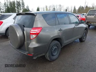 2009 Toyota RAV4 with VIN JTMZF33V995001985, listed as a IAAI auction lot 41932410 with 113,713 mi miles. Bid and sale history available at carsss.com. Image 4.