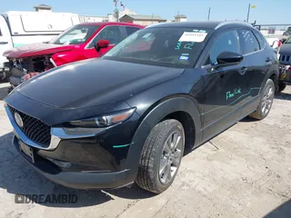2024 Mazda CX-30 S Premium with VIN 3MVDMBDM4RM651543, listed as a IAAI auction lot 41993345 with 25,675 mi miles and . Bid and sale history available at DreamBid. Image 2.